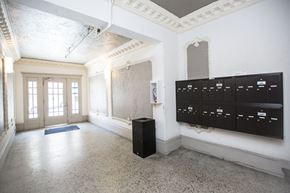 San Francisco apartment for rent - A room with a blue mat on the floor and a black cabinet.