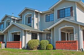 Temple apartment for rent - a house with a brick porch and blue siding