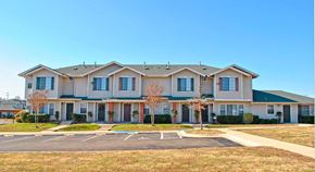 Temple apartment for rent - a large house with a parking lot in front of it