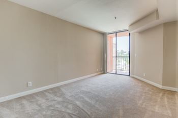 Bedroom with attached balcony