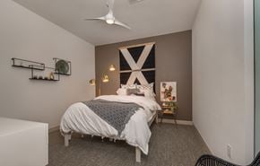 Brookfield apartment for rent - a bedroom with a bed and a ceiling fan