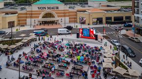 Brookfield apartment for rent - an aerial view of a crowd of people in front of a building