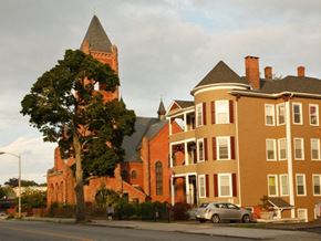 Worcester apartment for rent - a house with a tree in front of it on a street