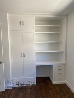 San Pedro apartment for rent - a closet with white cabinets and drawers and