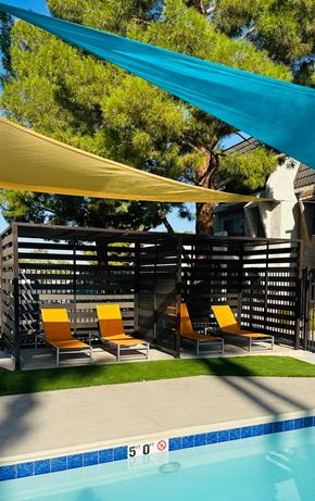 Las Vegas apartment for rent - A pool with a blue tarp over it.
