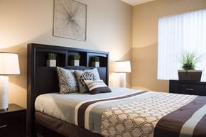 Broomfield apartment for rent - a bedroom with a large bed and a window