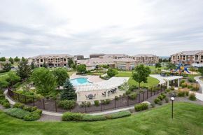Broomfield apartment for rent - an aerial view of a resort with a swimming pool