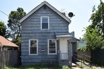 New Haven apartment for rent - A small house with a satellite dish on the roof.
