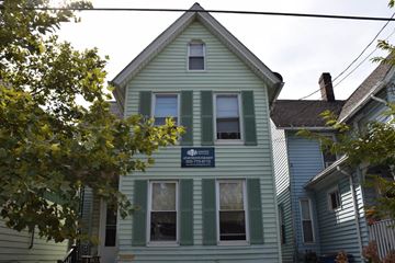 New Haven apartment for rent - A house with a sign that says "SOLD" on it.