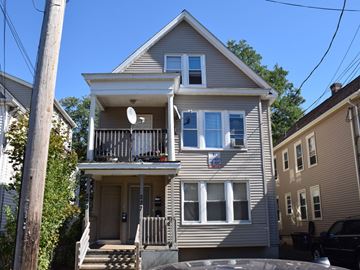New Haven apartment for rent - A two-story house with a balcony on the second floor.