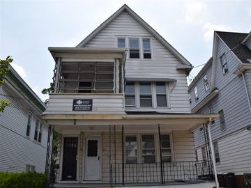 New Haven apartment for rent - A two-story house with a balcony on the second floor.