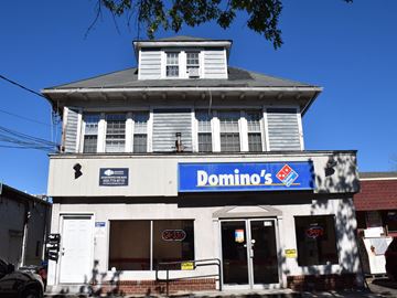 New Haven apartment for rent - A Domino's Pizza restaurant with a blue and white signboard.