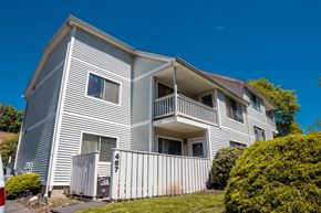 New Haven apartment for rent - A two-story residential building with a garage.