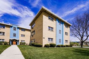 Skokie apartment for rent - a brick apartment building with a sidewalk in front of it