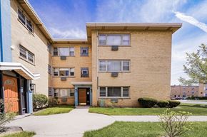Skokie apartment for rent - a brick apartment building with a sidewalk in front of it