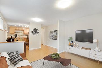 Denver apartment for rent - a living room with a couch and a television