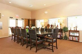 Avondale apartment for rent - a dining room with a long table and chairs