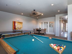Derby apartment for rent - a game room with a pool table and a ceiling fan