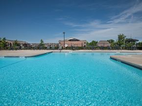 Derby apartment for rent - a large pool with a building in the background