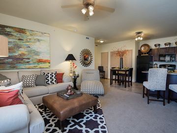 Grandview apartment for rent - a living room with a couch and a table
