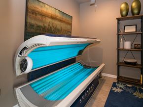 Shawnee apartment for rent - a spa room with a pool and a massage bed in it