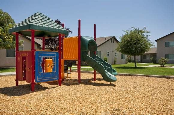 Shafter apartment for rent - a childrens playground with a slide