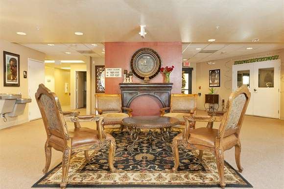 Glendale apartment for rent - a living room with a table and chairs and a fireplace