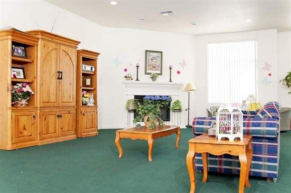 Delano apartment for rent - a living room with a couch and a table