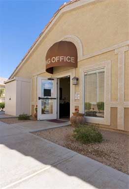 El Mirage apartment for rent - the front of a go office building with a brown sign