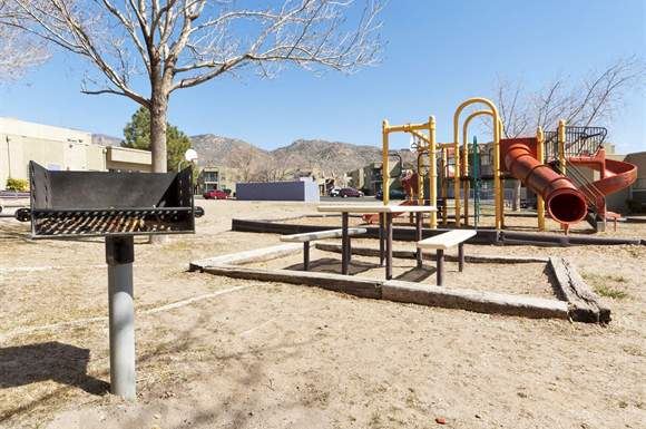 Albuquerque apartment for rent - a park with a playground and a tree