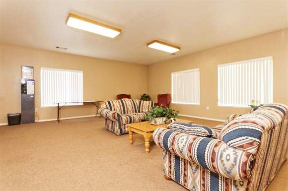 Porterville apartment for rent - a living room with two couches and a table