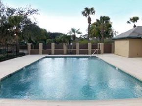 Orlando apartment for rent - a large swimming pool in the backyard of a house