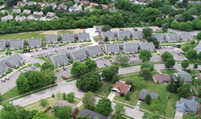 Lexington townhouse for rent - an aerial view of a neighborhood of houses and cars in a parking lot