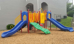 Lexington townhouse for rent - the playground at our apartments is equipped with slides and other equipment