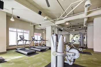High-end fitness center with yoga area