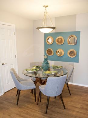 Bloomingdale apartment for rent - a dining room with a glass table and chairs