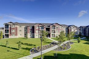 Lacey apartment for rent - Pathway with grass to apt buildings Lacey WA Apartments For Rent l Copper Wood Apts