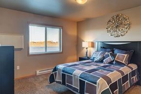 Sidney apartment for rent - A bedroom at Sidney Apartments in Sidney, Montana.