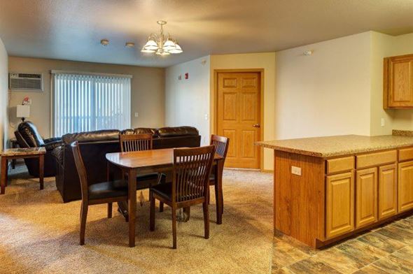 Tioga apartment for rent - a living room with a table and a couch