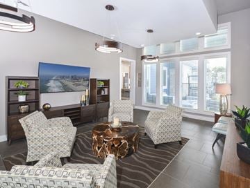 Austin apartment for rent - A living room with a zebra print rug and a coffee table.
