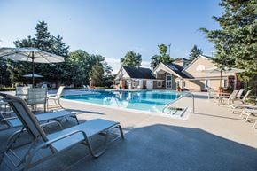 Vienna apartment for rent - Outdoor pool and lounge chairs at Merrifield at Dunn Loring Station apartments in Vienna, VA.