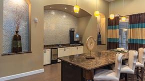 Peoria apartment for rent - a kitchen with a table and chairs