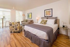 Seattle apartment for rent - Bedroom with a bed and natural light