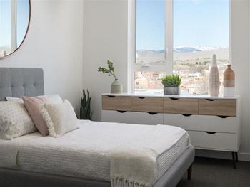 Comfortable bedroom with large window
