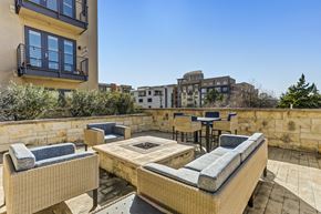 Houston apartment for rent - the reserve at city center spacious patio with fire pit and seating areas
