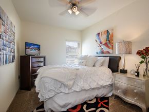 Manhattan apartment for rent - our apartments offer a bedroom with a bed and a ceiling fan