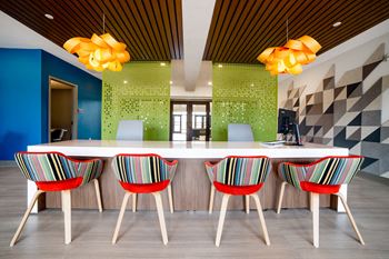 Colorfully striped seating clubhouse 