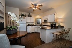 North Little Rock apartment for rent - a kitchen with white cabinets and a counter top