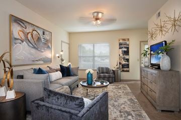 North Little Rock apartment for rent - a living room with a couch and a chair