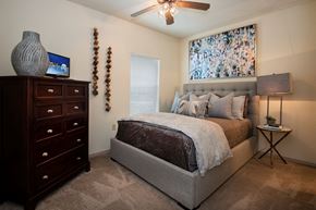 North Little Rock apartment for rent - a bedroom with a bed and a dresser
